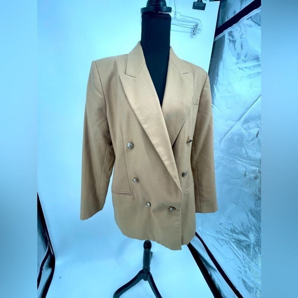 Stephanie Andrews's woman's blazer size medium beige color